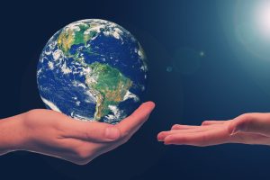 Sustainability - the world is in a hand, depicting the world is in our hands.