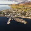 Aerial view of Ullapool and Loch Broom over looking the main part of the village and the harbour