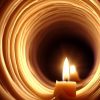 a candle burns tunnelling in the middle of a candle wax spiral tunnel