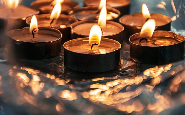 Lit tea light candles